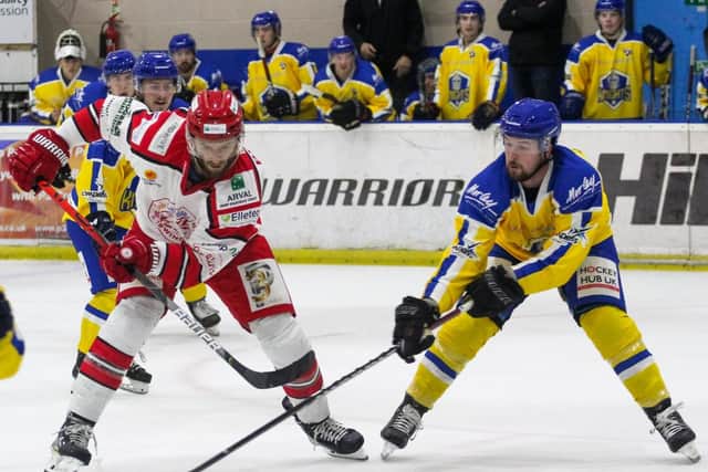 UP FOR IT: Leeds Knights' Bobby Streetly, right, battles for possession in the pre-season game at Swindon Wildcats. Picture courtesy of Kat Medcroft/Wildcats Media.