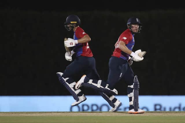 On the move: Yorkshire pair Jonny Bairstow, right, and  Dawid Malan run between the wickets for England. (AP Photo/Aijaz Rahi)