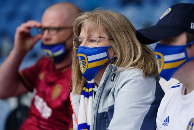 Leeds United fans wearing face coverings. Pic: Jon Super.