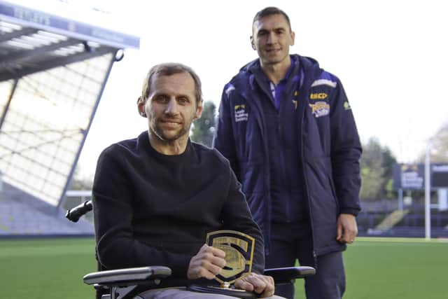 Leeds Rhinos' legend Kevin Sinfield presents Rob Burrow with the Spirit of Super League award. Sinfield will now run 101 miles in 24 hours for his old friend. (Picture: Phil Daly/SWPix.com)