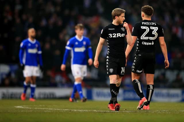 Leeds United's Eunan O'Kane leaves the field after being shown red at Portman Road. Pic: Stephen Pond.