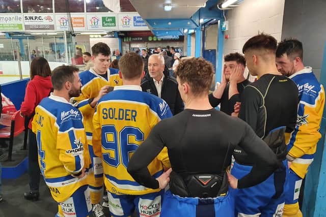 Knights defencemen listen to head coach Dave Whistle ahead of the team's first-ever game as Leeds Knights at Swindon