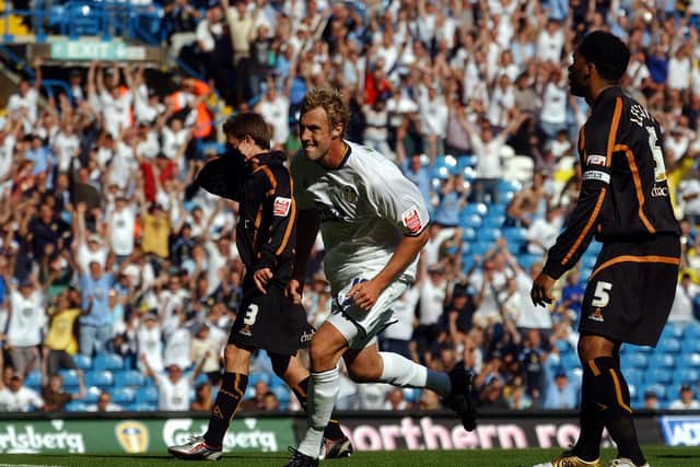 RUN OVER: Future England defender Joleon Lescott, right, looks on as Rob Hulse, centre, races away to celebrate putting Leeds United 2-0 up en route to victory against Wolves at Elland Road back in August 2005. Picture by Varleys.