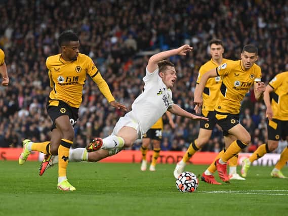 BIG MOMENT - Joe Gelhardt won a stoppage time penalty that allowed Rodrigo to equalise for Leeds United against Wolves. Pic: Bruce Rollinson