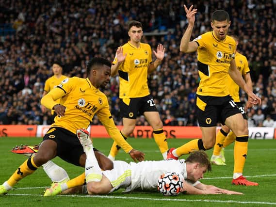 DISPUTED PENALTY - Wolves boss Bruno Lage felt the spot-kick won by Joe Gelhardt was 'very soft' as Leeds United rescued a point late on. Pic: Getty