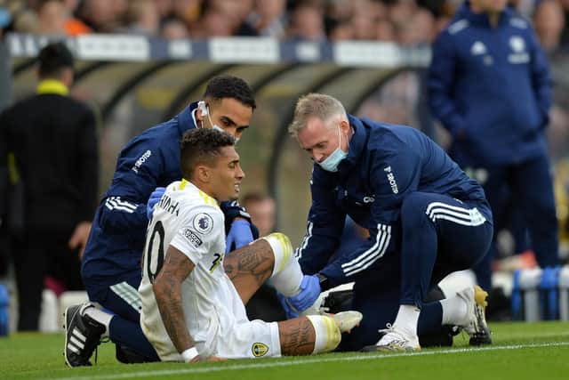Raphinha receives treatment on the field before being substituted. 
Picture: Bruce Rollinson.