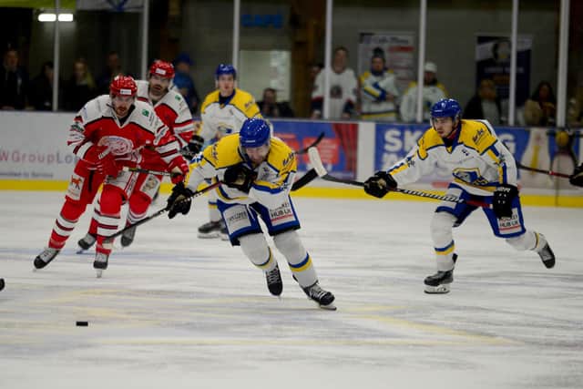 Leeds Knights' Jordan Fisher strives to regain control of the puck during Sunday night's clash with Swindon Wildcats at Elland Road Ice Arena Picture: James Hardisty.
