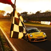 Champion: Dan Cammish crosses the line at Brands Hatch to clinch the Porsche Carrera Cup GB championship title. (Picture: Jacob Ebrey/JEP)