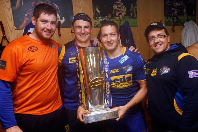GREAT DAYS: Richard Hunwicks, second right, pictured with David O'Sullivan, Danny McGuire and Jason Davidson, far right, with the 2011 Super LEague Grand Final trophy. Picture: Vaughn Ricley/SWPix.com