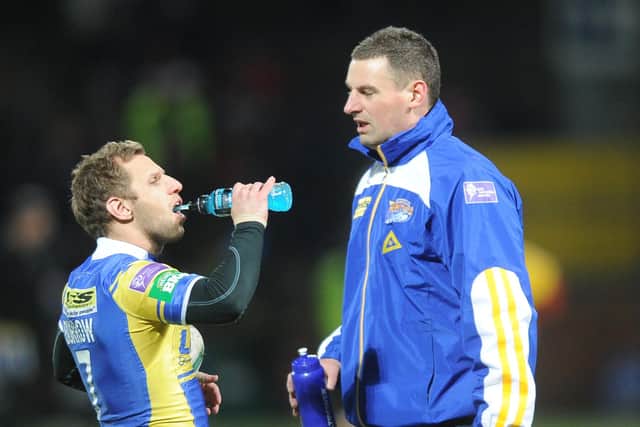Richard Hunwicks, pictured when Leeds Rhinos' strength and conditioning coach, chats with Rob Burrow. Picture: Steve Riding.