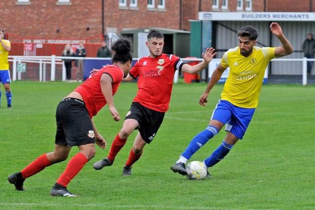 Harjashun Bhandal of Horsforth St Margaret's comes away with the ball against Knaresborough Town. Picture: Steve Riding.