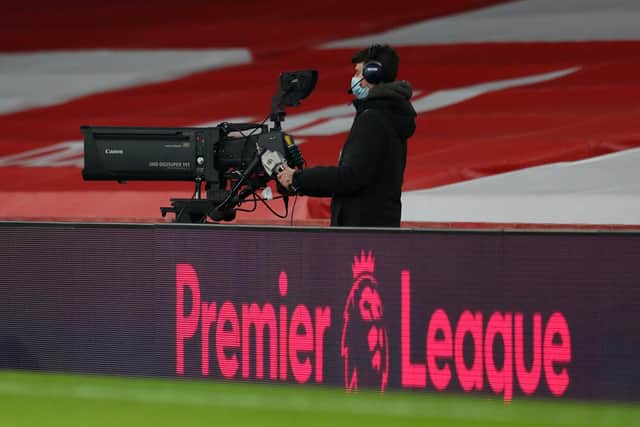 A cameraman captures the action at the Emirates Stadium. Pic: Catherine Ivill.