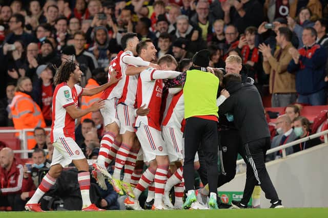 Arsenal's players celebrate at the Emirates following their opening goal against Leeds United. Pic: Bruce Rollinson
