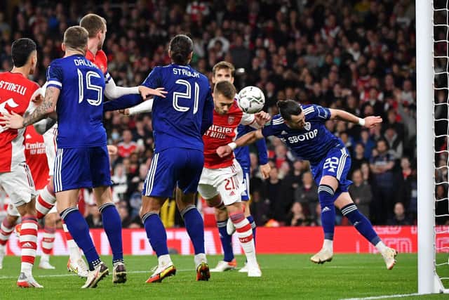 PRAISE: For Leeds United from Gunners defender Calum Chambers, centre, pictured heading Arsenal in front in Tuesday evening's Carabao Cup clash at the Emirates. Photo by JUSTIN TALLIS/AFP via Getty Images.