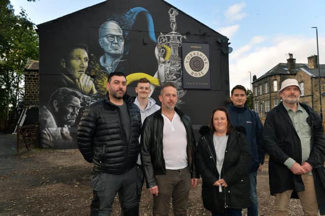 Phil Harris with members of the Leeds United Supporter's Trust at the official unveiling of the mural.