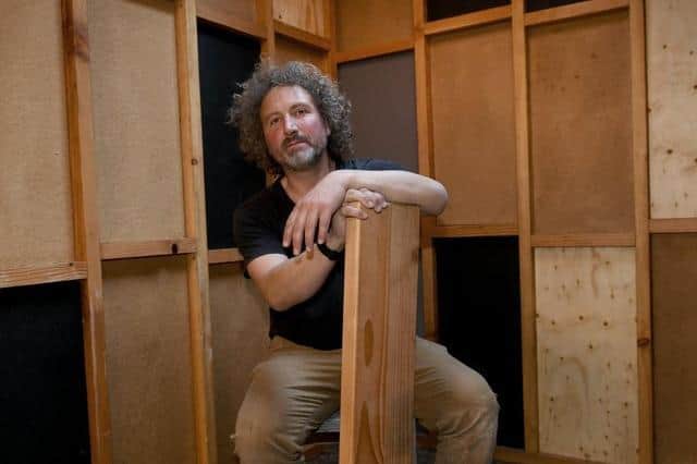 Artist and architect Nicolas Henninger building the sustainable CABANON cabin. Photo: Gary Longbottom