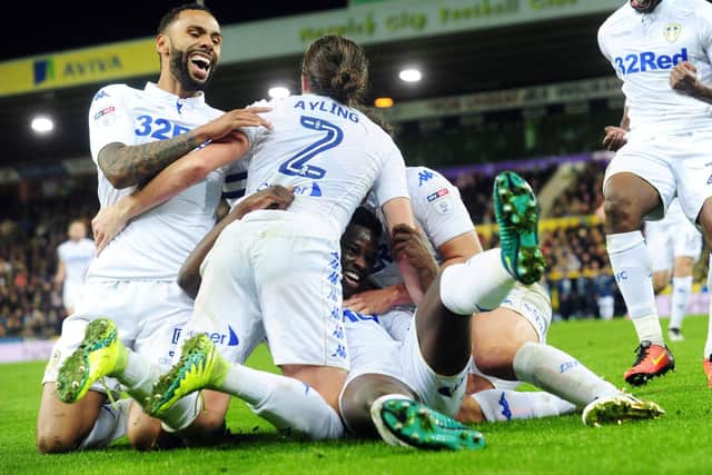 CARROW ROAD CRACKER: Ronaldo Vieira, centre, is mobbed by his Leeds United team mates after his last-minute winner which sealed a 3-2 victory at Championship hosts Norwich City back in November 2015. Picture by Simon Hulme.
