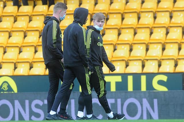 ON THE BENCH: Leeds United's 19-year-old forward Joe Gelhardt, right. Picture by Simon Hulme.