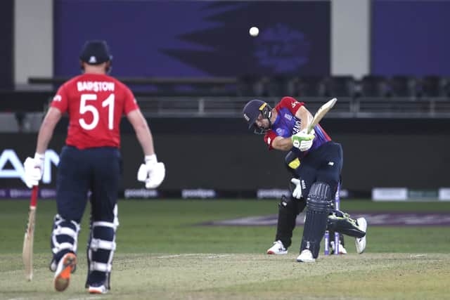 BIG HITTER: England's Jos Buttler hits a six during the Twenty20 World Cup group clash against Australia in Dubai Picture: AP/Aijaz Rahi