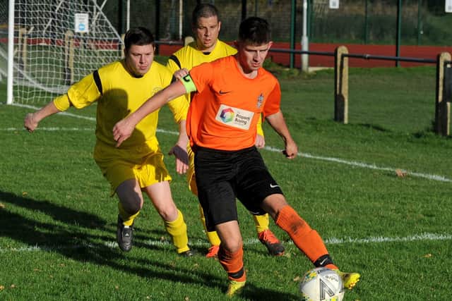 Joah Wilson, of Wetherby Athletic, shields the ball during Saturday's West Yorkshire League Cup encounter with visiting Old Centralians. Picture: Steve Riding.