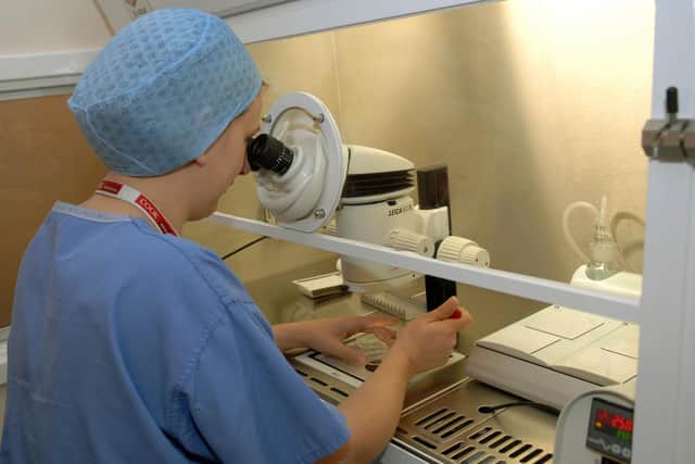 From the archive: An embryologist, pictured in 2010, at the fertility unit at Seacroft Hospital in Leeds checking eggs and embryos under the microscope. Picture: Gary Longbottom