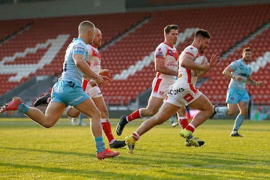 James Bentley scores for St Helens against Wakefield in April, 2021. Picture by Ed Sykes/SWpix.com.