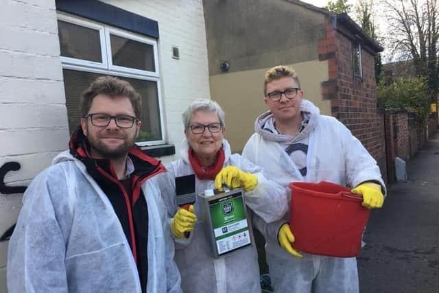 Headingley and Hyde Park councillors (from left) Neil Walshaw, Al Garthwaite and Jonathon Pryor are pictured using anti-urine paint in 2018.