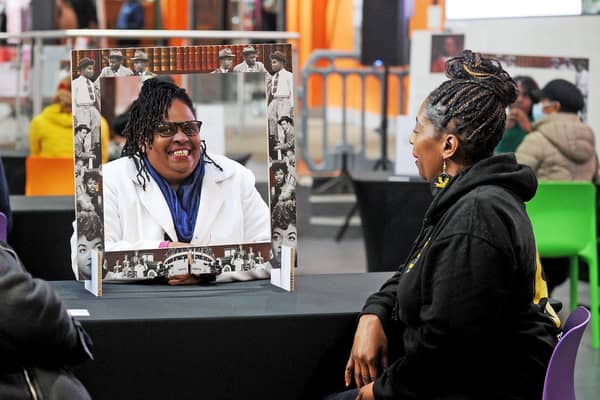 The event's organiser, Dionne Edwards, right, listening to the story of Sharon Hamilton (Photo: Steve Riding)