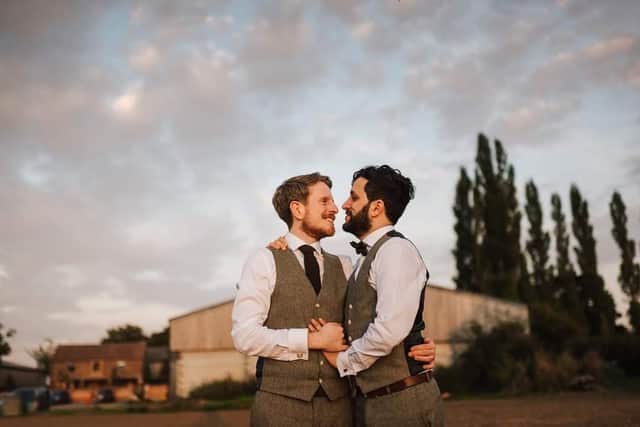 Liam (left) and Nima Lawlor-Baniamer pictured at their wedding ceremony a venue in North Yorkshire on Saturday September 18.