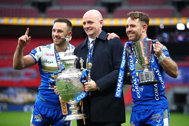 Luke Gale, pictured left with coach Richard Agar and man of the match Richie Myler, captained Rhinos to victory in the 2020 Cup final. Picture by Michael Steele/Getty Images.