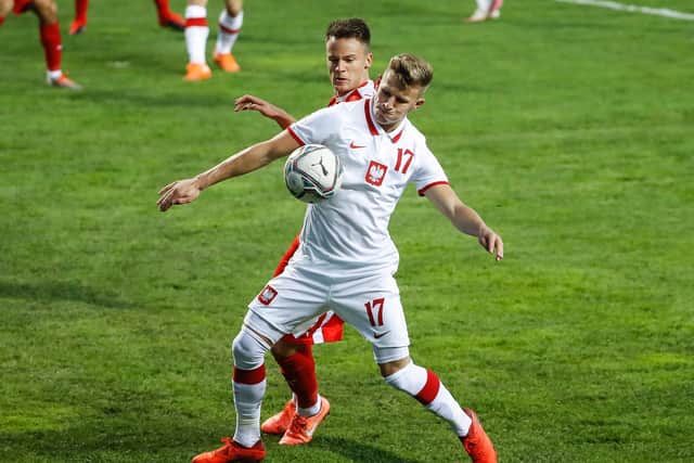 Leeds United's Mateusz Bogusz in action for Poland. Pic: Getty
