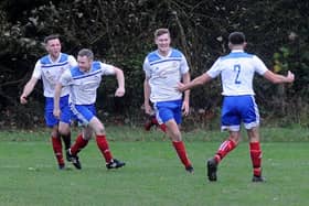 Jack Farrimond, third left, celebrates with his team-mates after scoring Pool's winner in a 2-1 West Riding County Challenge Cup victory against Carlton Athletic. Picture: Steve Riding.