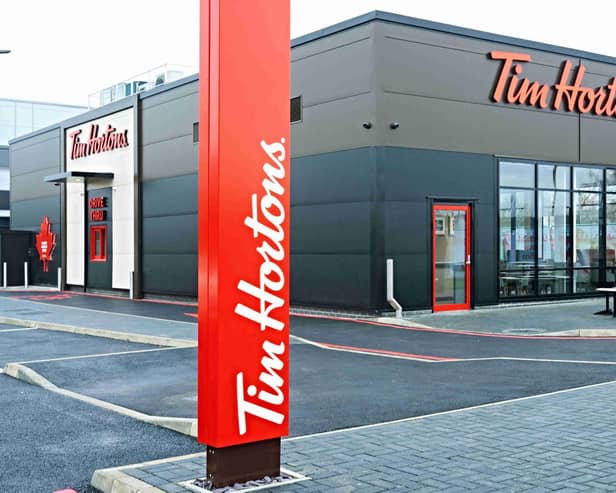 A customer queued for more than 12 hours overnight to win free drinks for a year by becoming the first person through the door of the new Tim Hortons Birstall branch.
cc Tim Hortons