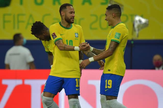 Leeds United's Raphinha alongside PSG's Neymar. Pic: Nelson Almeida.