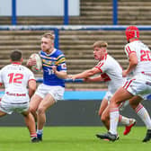 Ben Sheils, with ball, has left Rhinos' academy to sign for Sheffield. Picture by Craig Hawkhead Photography/Leeds Rhinos.