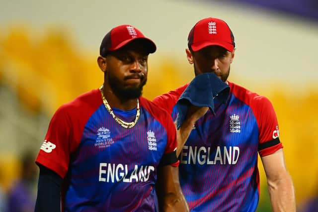 Chris Jordan and Chris Woakes of England stand dejected following defeat to New Zealand. (Photo by Alex Davidson/Getty Images)