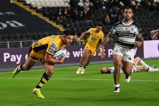 Niall Evalds scores for Castleford at Hull last season. Picture by Jonathan Gawthorpe.