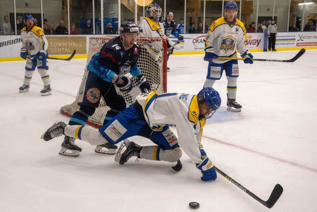 Archie Hazeldine falls under pressure from James Spurr as  Leeds Knights defeated Sheffield Steeldogs. ( Picture: Bruce Rollinson)
