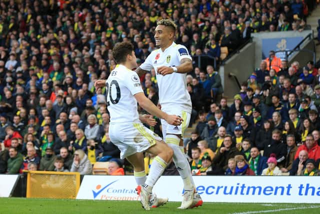 Leeds United team-mates Dan James and Raphinha celebrate a goal at Norwich City. Pic: Getty
