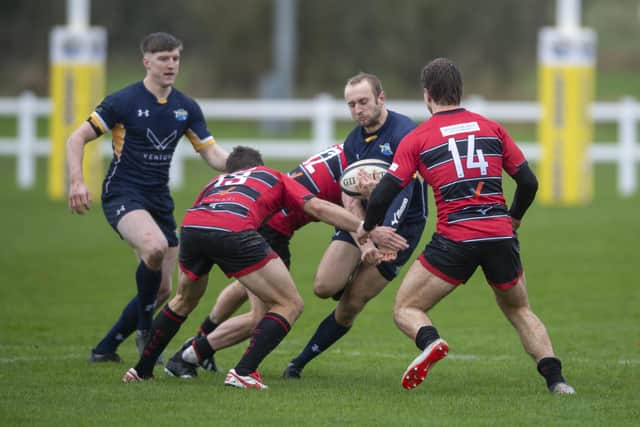 Leeds Tykes' Andrew Lawson, with ball, scored a hat-trick at Caldy. Picture: Tony Johnson.