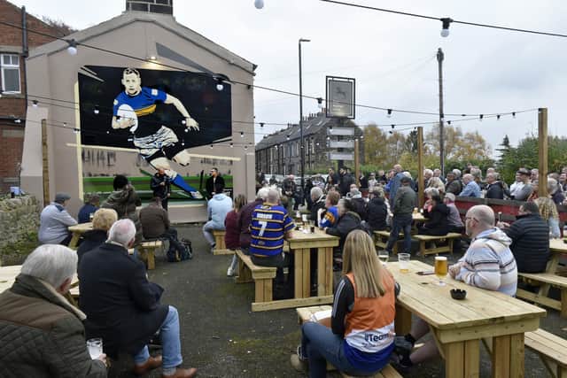 Former Leeds Rhino's players Jamie Jones-Buchanan and Barrie McDermott attended the unveiling of the Rob Burrow mural at the Bay Horse pub in Meanwood.