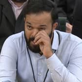 Screen grab from Parliament TV of former cricketer Azeem Rafiq crying as he gives evidence at the inquiry into racism he suffered at Yorkshire County Cricket Club, at the Digital, Culture, Media and Sport (DCMS) committee (Parliament TV)