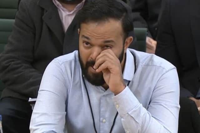 Screen grab from Parliament TV of former cricketer Azeem Rafiq crying as he gives evidence at the inquiry into racism he suffered at Yorkshire County Cricket Club, at the Digital, Culture, Media and Sport (DCMS) committee (Parliament TV)