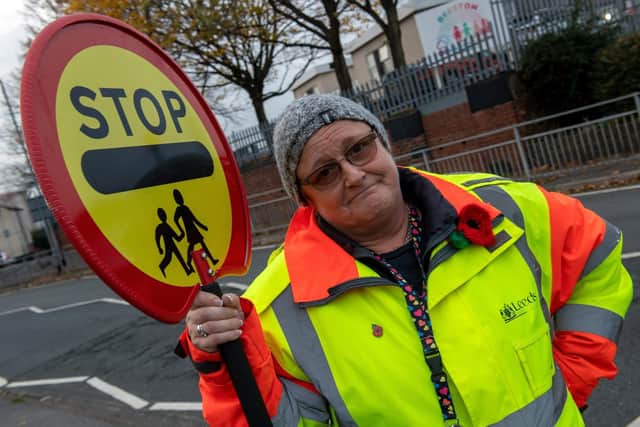 School lollipop lady, Deborah Lawrence is campaigning for more protection after incidents of abuse and dangerous driving have increased outside schools.