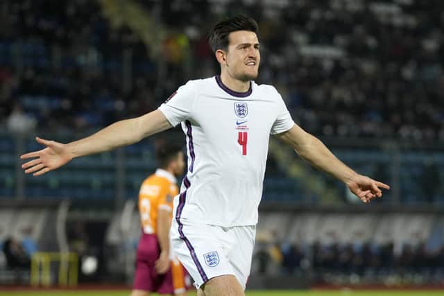 England's Harry Maguire celebrates after scoring his side's opening goal against San Marino Picture: AP/Antonio Calanni