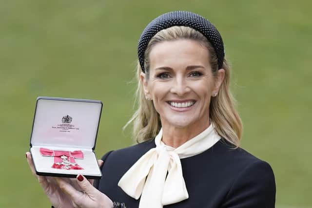 Gabby Logan with her MBE (Member of the Order of the British Empire) medal presented by the Duke of Cambridge at Windsor Castle after an Investiture Ceremony.
