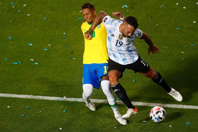 ALL BALL? Nicolas Otamendi of Argentina catches Raphinha of Leeds United and Brazil during a match at San Juan del Bicentenario Stadium. Pic: Getty