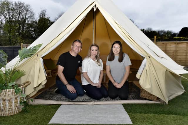 As their business expands, Rebecca and Glenn have hired their first staff member, Pollyanna (right), who helps to set up tents and design packages (Photo: Steve Riding)