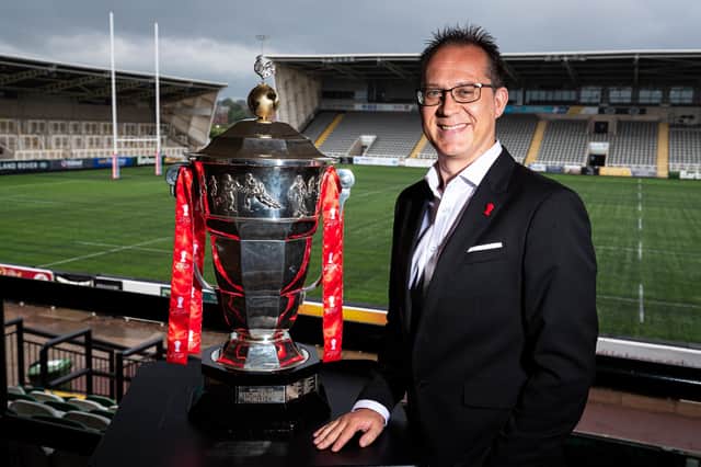 FULL STEAM AHEAD: Rugby league World Cup chief executive Jon Dutton with the trophy. Picture: Alex Whitehead/SWpix.com.