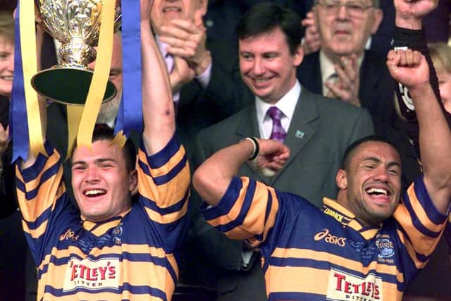 Iestyn Harris and man of the match Leroy Rivett collect the Challenge Cup in 1999. Picture: Brice Rollinson.